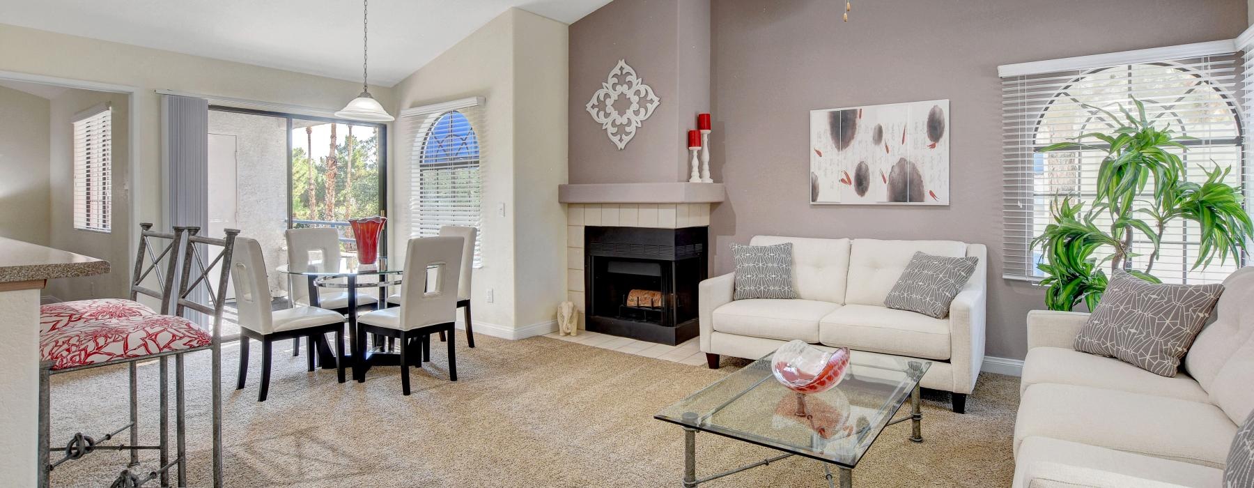 a living room with a fireplace