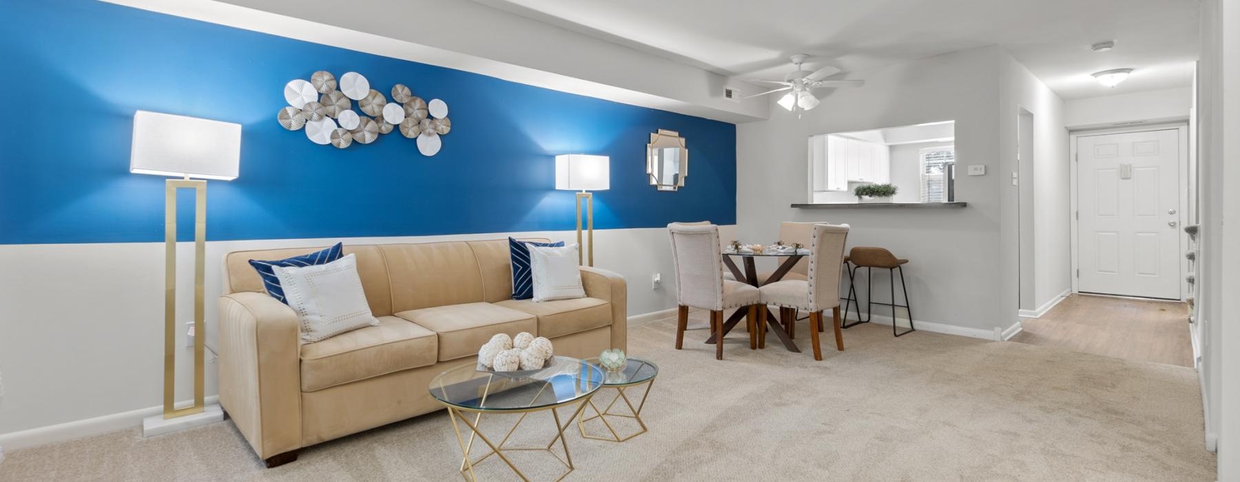 a living room with a couch and a table