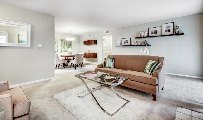 a living room with a couch and a coffee table