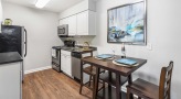 Dining area next to open kitchen