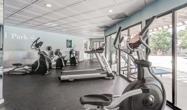 a gym with treadmills