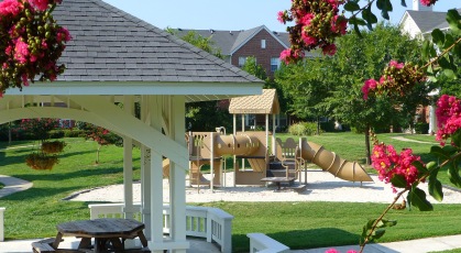 Gazebo and playground among beautifully landscaped grounds