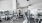 brightly lit gym with ceiling fans and central ac