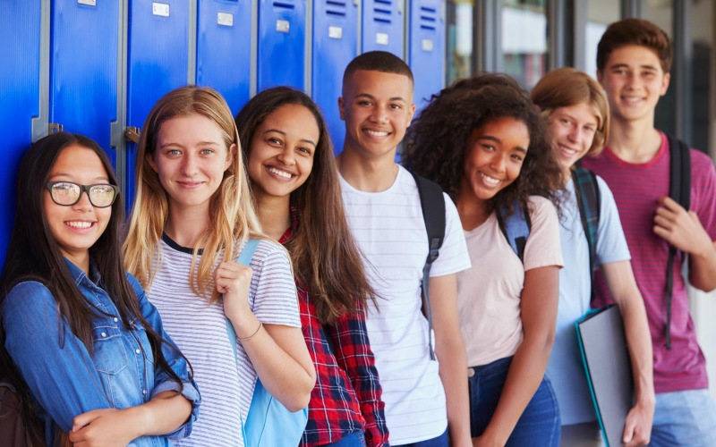 a group of people posing for a photo