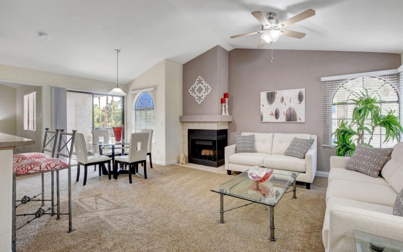 a living room with a fireplace