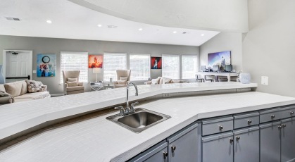 Clubhouse with a fully equipped kitchen and bar top seating 
