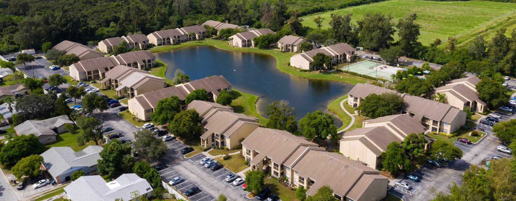 a pond in the middle of a building complex