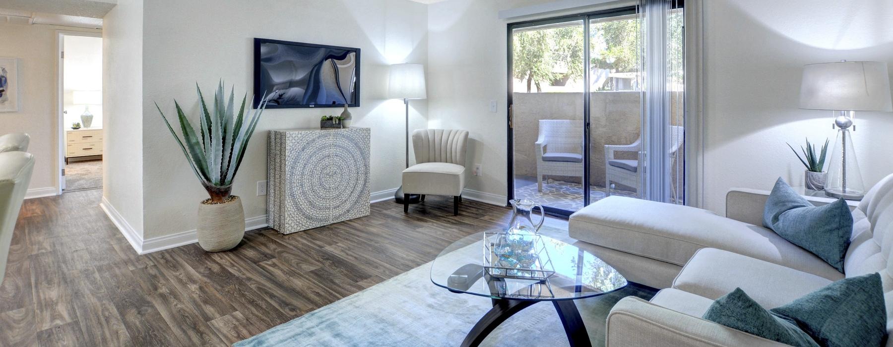 a living room with a large glass door