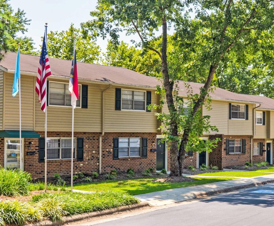a building with flags on the front
