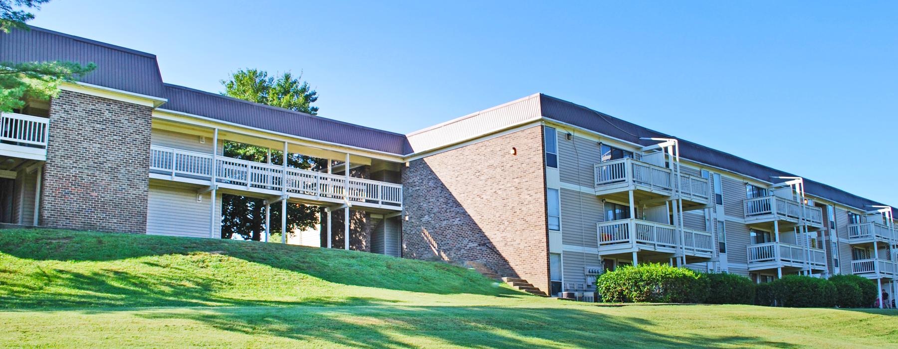 a building with a lawn in front