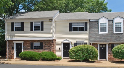 Exterior image of London Towne shows brick and siding exterior