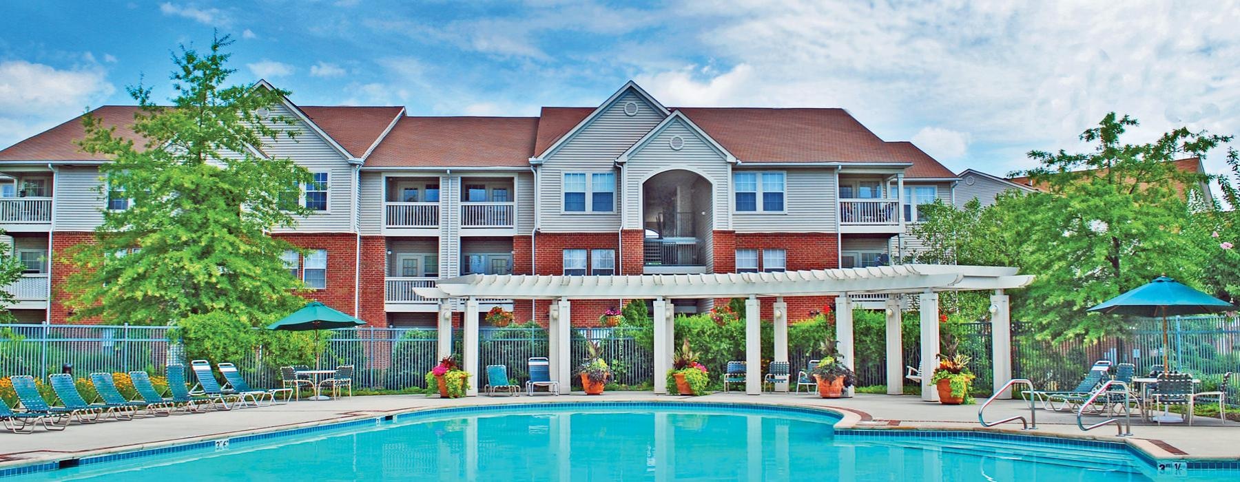 a pool in front of a building