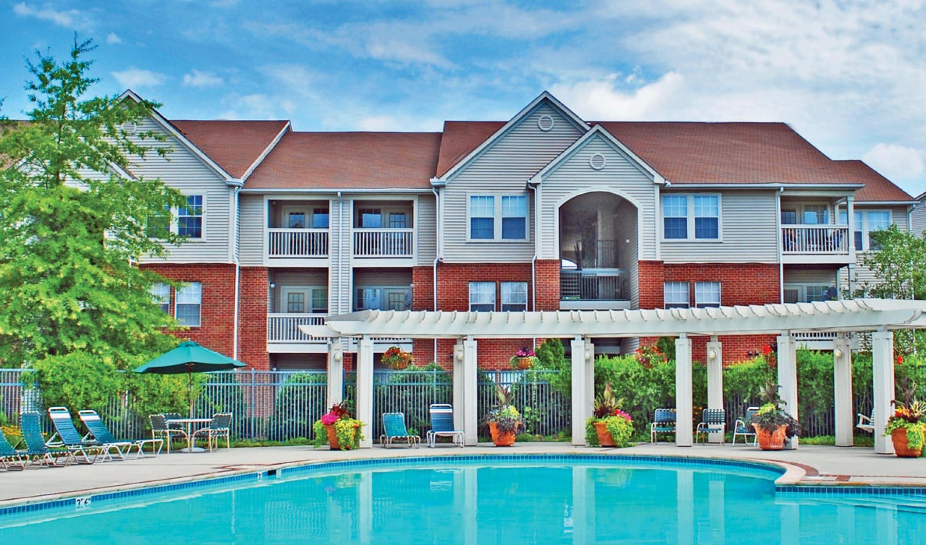 a pool in front of a building
