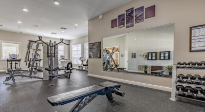 Fitness center with cardio and strength training equipment