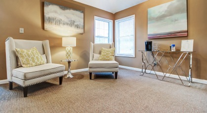 Clubhouse with coffee maker and plush seating