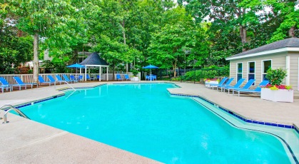Large pool with gazebo area and lounge seating