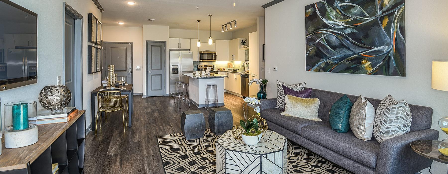 a living room with a couch and a table