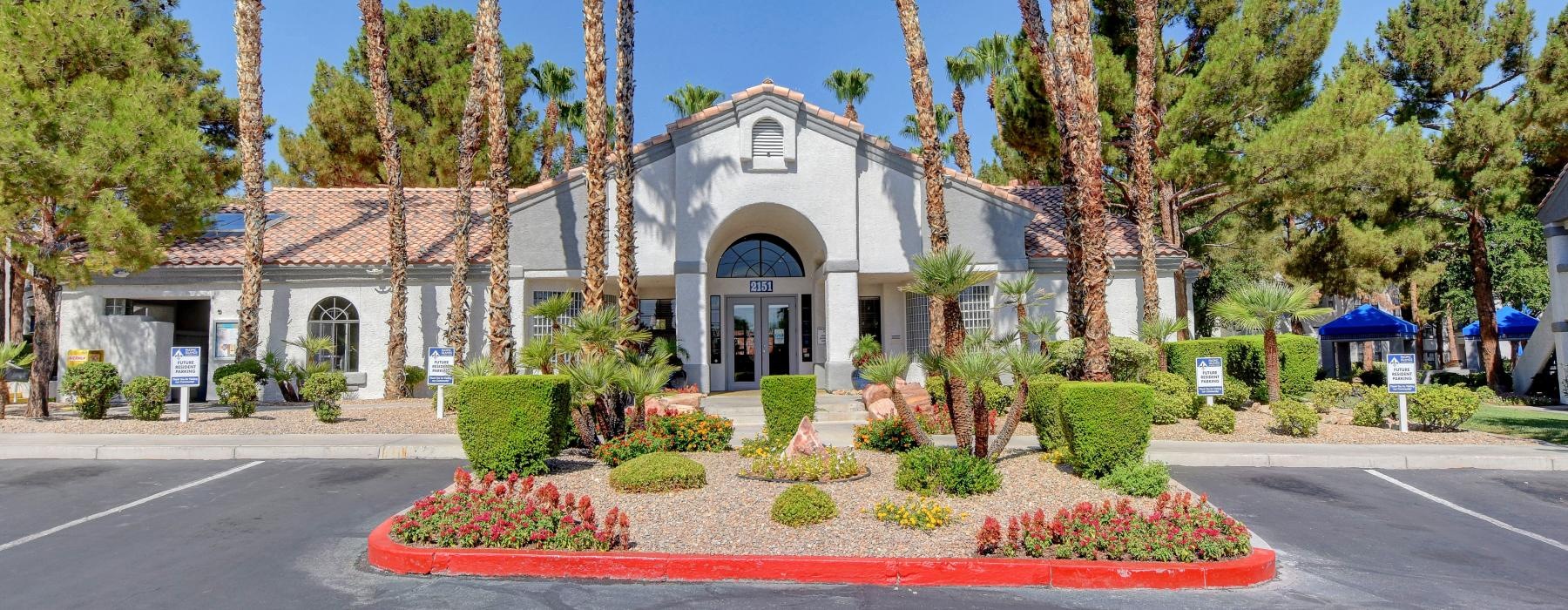 palm trees surround leasing office exterior