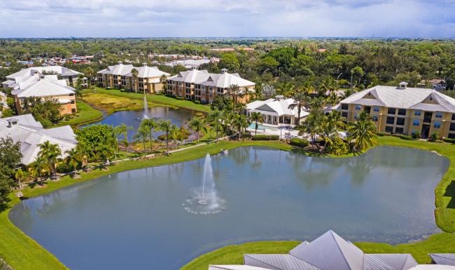 a body of water with buildings around it