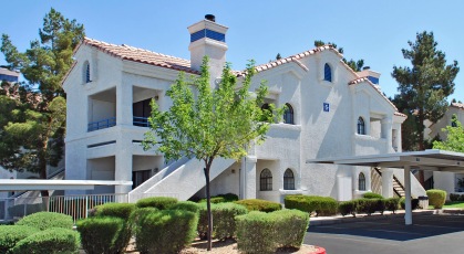 Condo-style homes with landscaped grounds