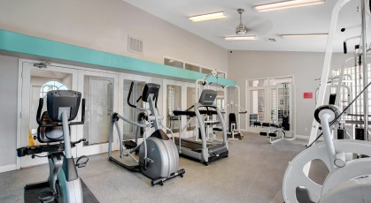 Fitness center with cardio and strength training machines