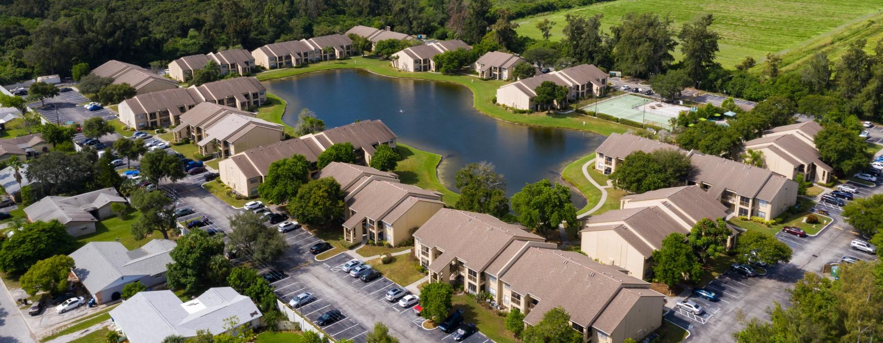 a pond in the middle of a building complex