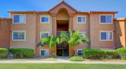 Well manicured lawns and walkways at Royal Palms