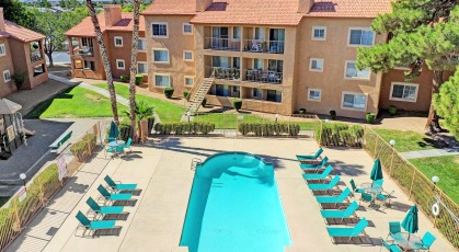 Aerial view of second, gated, pool is centrally situated on the property