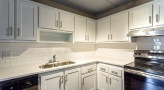 Spacious kitchen counters and ample cabinet storage