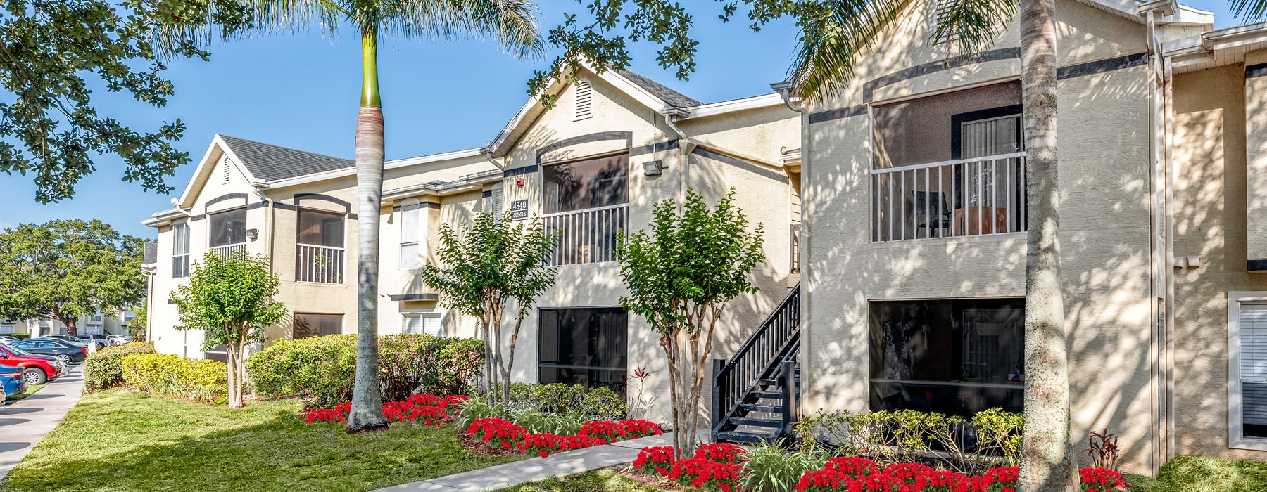 two story Sawgrass Cove apartment buildings with private balconies and screened patios