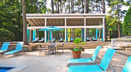 Poolside cabanas and adjustable lounge chairs