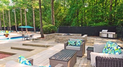 Social area at the pool with fire pit and seating