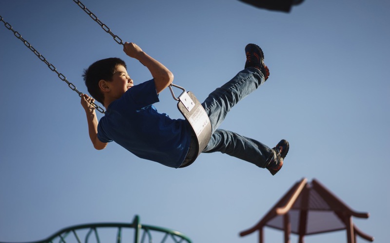 a boy on a swing