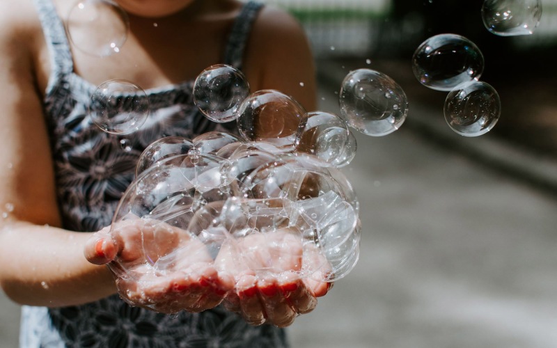 child with bubbles