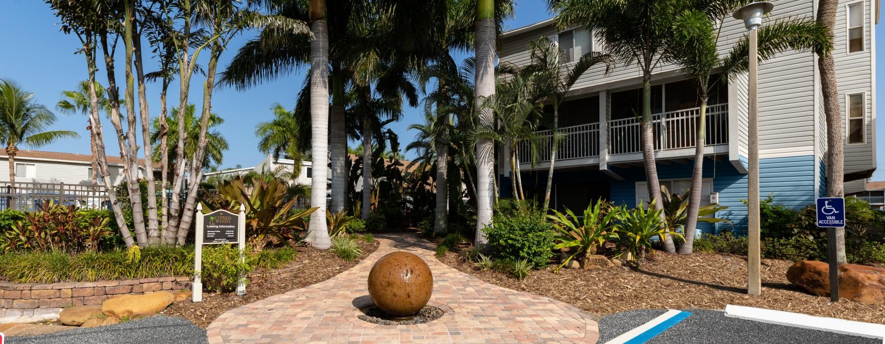 a building with palm trees