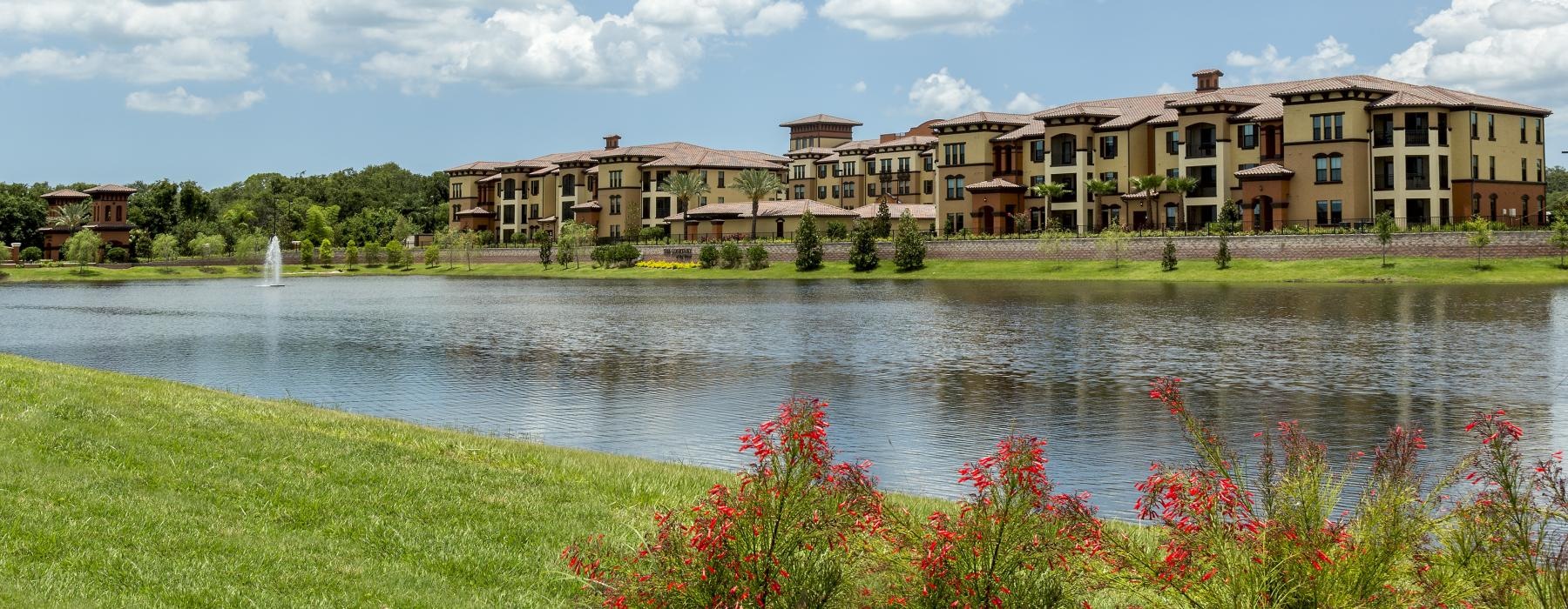 a body of water with buildings along it