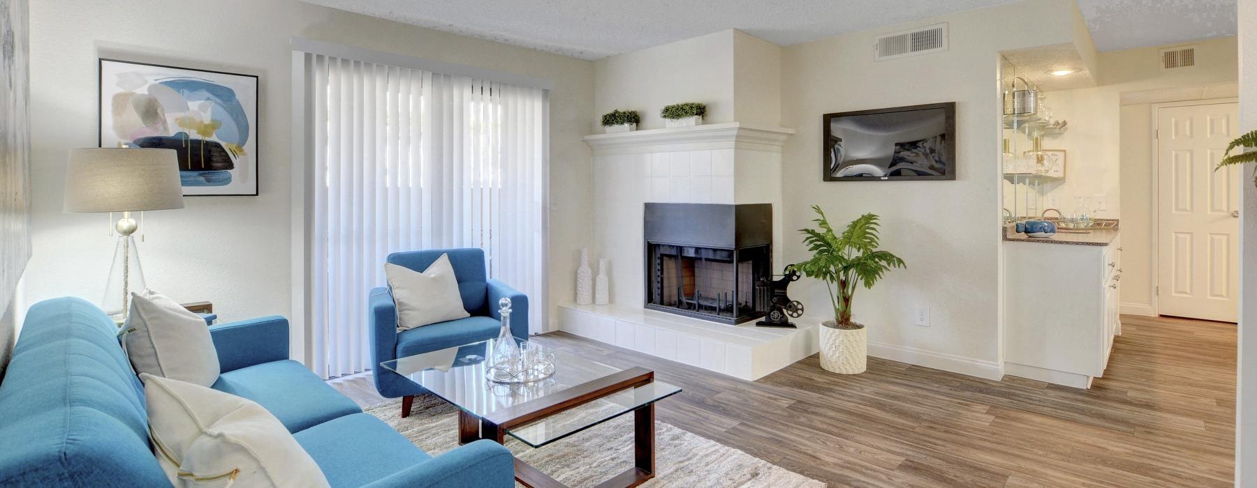 a living room with a fireplace