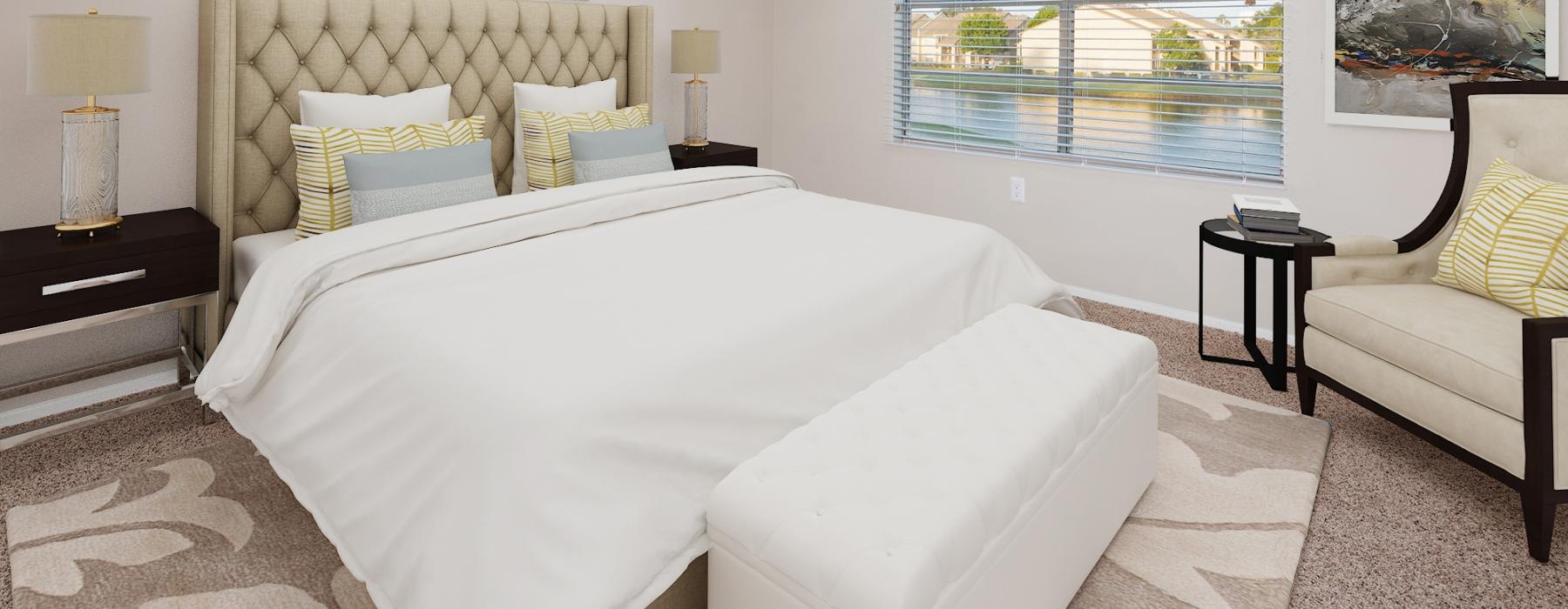 a bedroom with a large bed and a window