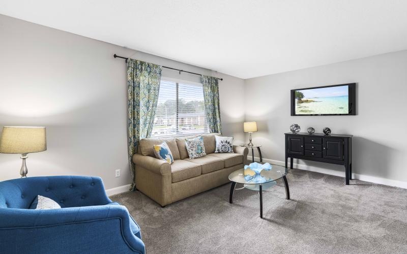 a living room with a couch and a coffee table