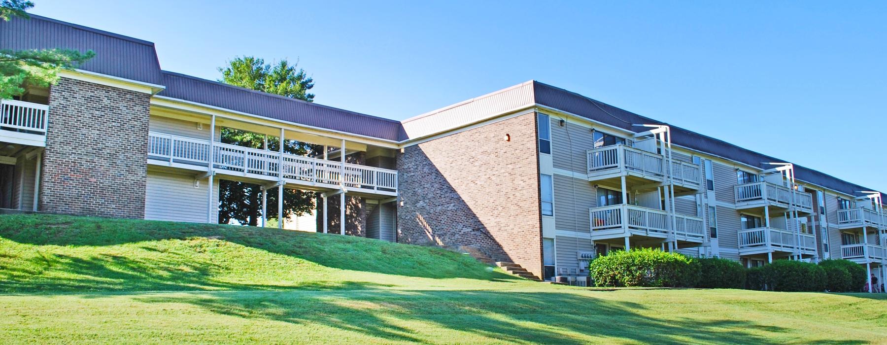 a building with a lawn in front