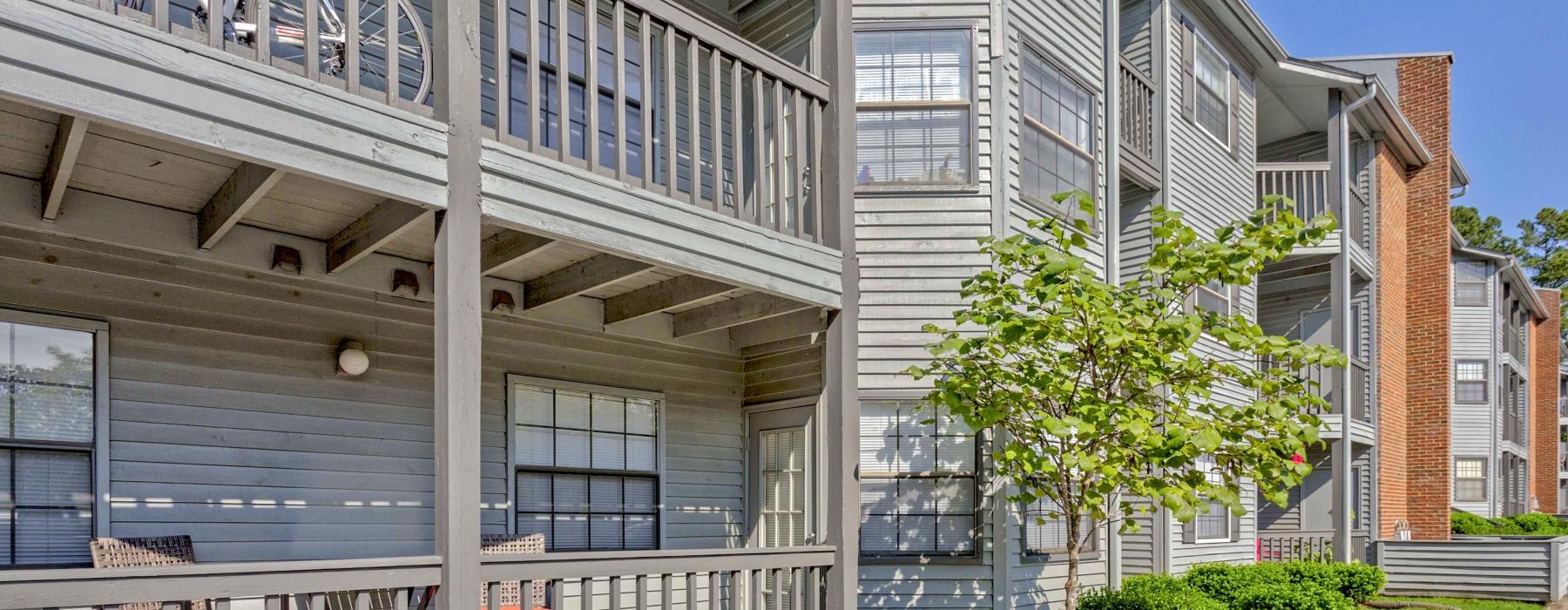 a building with a tree in front
