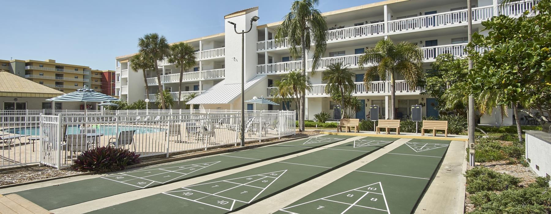 a game area next to a pool